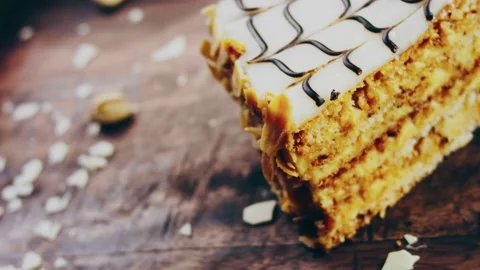 Picasso effect of Esterhazy cake on a wooden tray with decorations Stock Footage 231907570