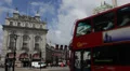 Piccadilly Circus London United Kingdom UK Double Decker Bus Passing Traffic Day HD Footage