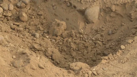 Pick ax breaking rocks Stock Footage 57714286