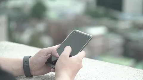 Pick up the Cell Phone 스톡 동영상 79867485