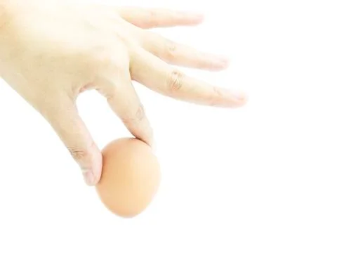 Pick Fresh egg with two finger hand Stock Photos