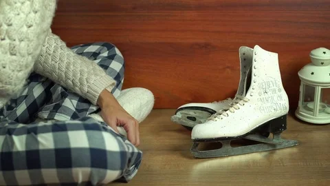 Pick up Ice skates Stock Footage 70114281