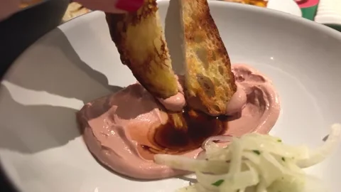 Pick up pieces of bread croutons chicken pate with soy sauce restaurant serving 스톡 동영상 292694270