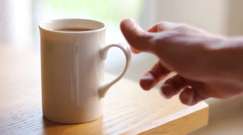 Pick up/put down tea cup/mug Vídeo Stock 37850435