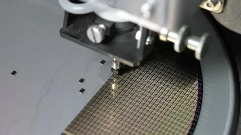 Pick up silicon die  in die attach machine in semiconductor manufacturing, Stock-Footage 197034299
