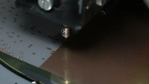 Pick up silicon die  in die attach machine in semiconductor manufacturing, Stock Footage 197034578