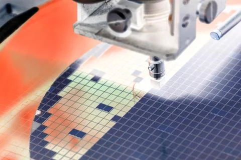 Pick up silicon die in die attach machine in semiconductor manufacturing Stock Photos