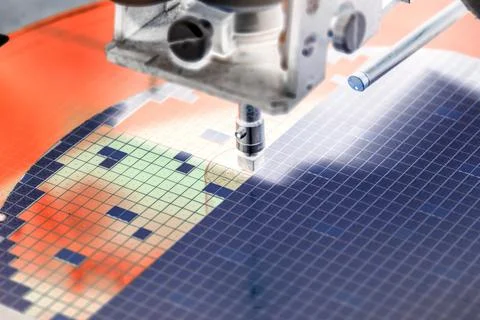 Pick up silicon die in die attach machine in semiconductor manufacturing Stock Photos