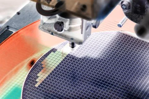 Pick up silicon die in die attach machine in semiconductor manufacturing Stock Photos
