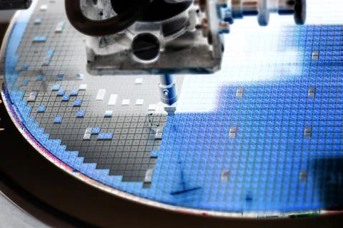 Pick up  silicon wafer in die attach machine in semiconductor manufacturing Stock Photos
