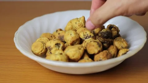 Pick snack from plate Stock Footage 322790225