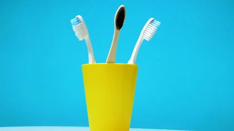 Pick up a toothbrush Squeeze toothpaste onto a toothbrush. Dental care Stock Footage 212617949