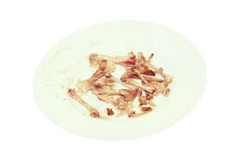Picked bones on plate.Isolated. Stock Photos