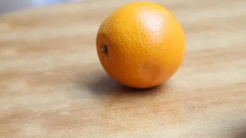 Picked Oranges on tabletop Stock Footage 112309058