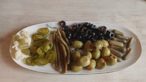 Pickeled Finger Platter Dish Olive and Pickels Stock Footage 100342201