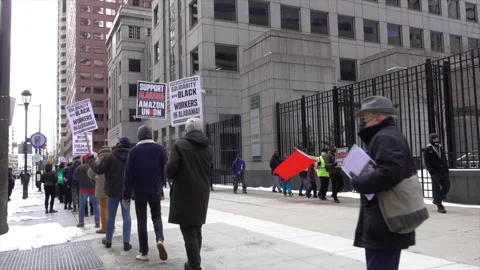Picket line supporting unionizing Amazon warehouse workers. Stock Footage 317615469