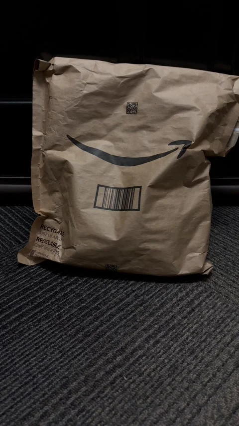 Picking up an Amazon package Stock Footage 282768160