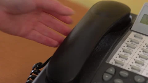Picking Up and Hanging Up Office Phone Stock Footage