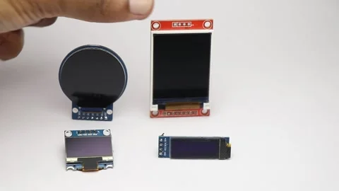 Picking up and placing various display modules on white background Stock Footage 345885540