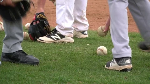 Picking up Baseballs 스톡 동영상 77368376