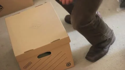 Picking up a box correctly Stock Footage 10908009