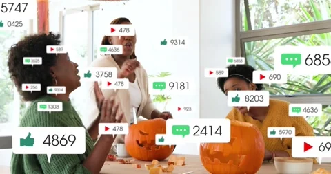 Picking up carving knives three hosts carving pumpkins in craft tutorial while Vídeos de archivo 316703264