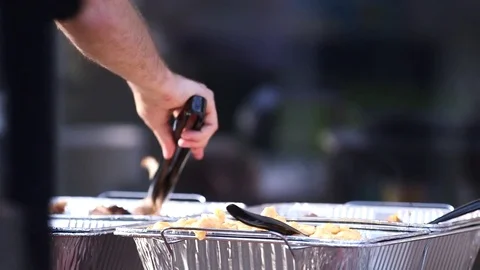 Picking Catered BBQ Stock Footage 72858362
