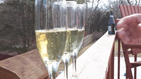 Picking up champagne glass close move 動画素材 103294398