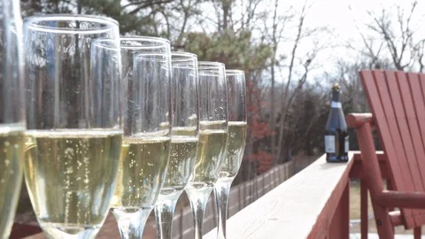 Picking up champagne glass move in deck Stock Footage 103294394