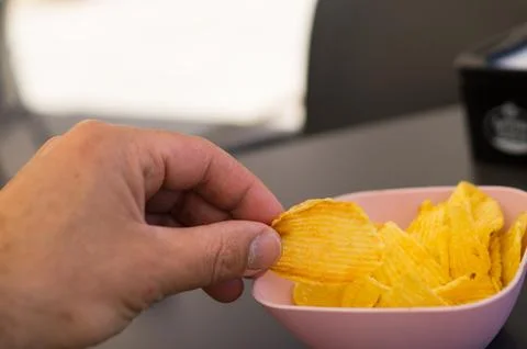 Picking up chips Stock Photos