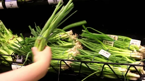Picking up chives Stock Footage 55874260