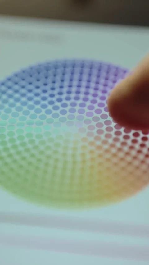 Picking a color on a circular gradient of colors within a creative application 库存影片 327451697