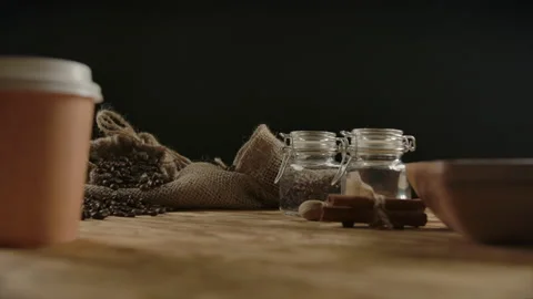 Picking up disposable paper cup with coffee to go, Female hand taking away drink Stock Footage 136814498