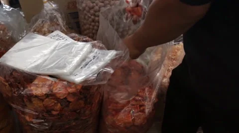 Picking Up Dried Octopus In Pengkalan Kubur Market at Kelantan, Malaysia Stock Footage 34730606