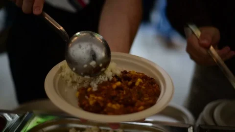 Picking food from  buffet at the conference Stock Footage 71120106