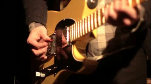 Picking guitar in slow motion Stock Footage 11335651