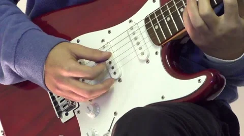 Picking Guitar Strings Stock Footage 58273562