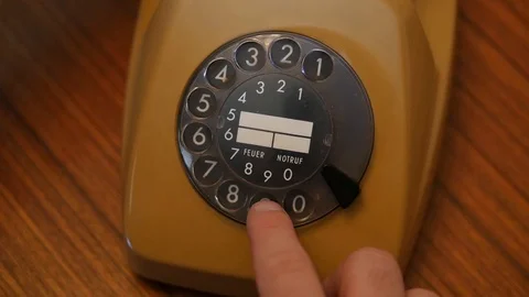 Picking up handset and dialing 911 Stock Footage 88256770
