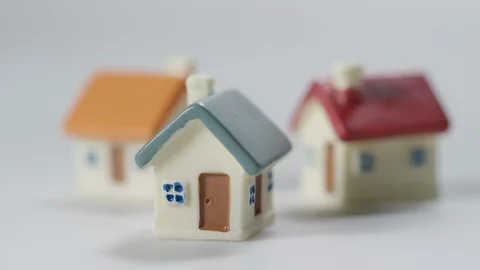 Picking up house macro fingertips Stock Footage 94035991