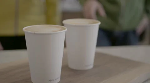 Picking up lattes Stock Footage 61243916