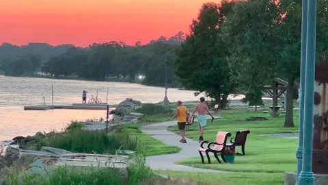 Picking Up Litter - River's edge - Bettendorf, IA - August 8, 2024 Stock Footage 282810738
