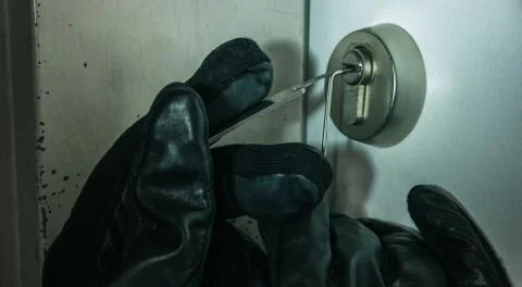 Picking a lock Stock Photos