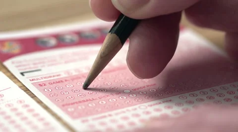 Picking lottery ticket numbers Stock Footage 47989603