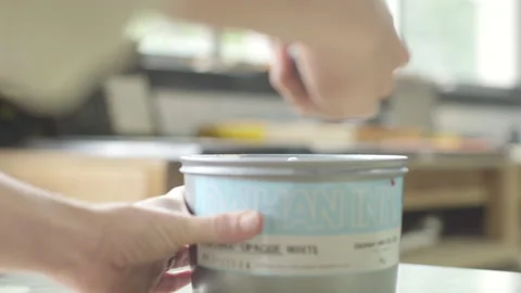 Picking up paint with chisel Stock Footage 160518076