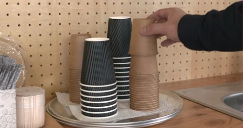 A picking up a paper cup of work tools in office Stock Footage 122090666