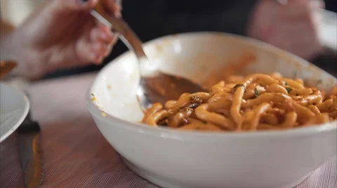 Picking up Pasta Stock Footage 62984519