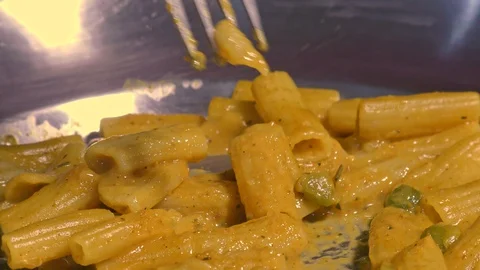 Picking pasta with fork Video stock 128198965