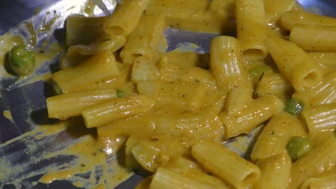 Picking pasta with fork Stock Footage 128200334