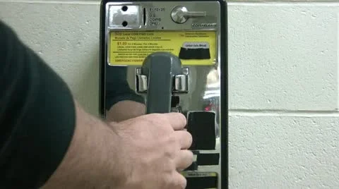 Picking Up Pay Phone &amp; Dialing Video stock 12610211