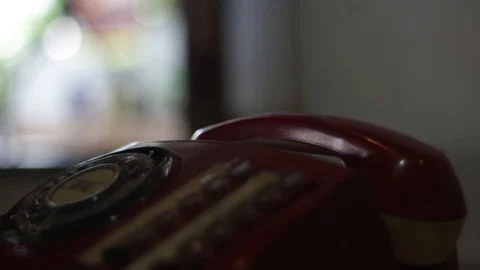 Picking up phone calls from an old telephone Stock Footage